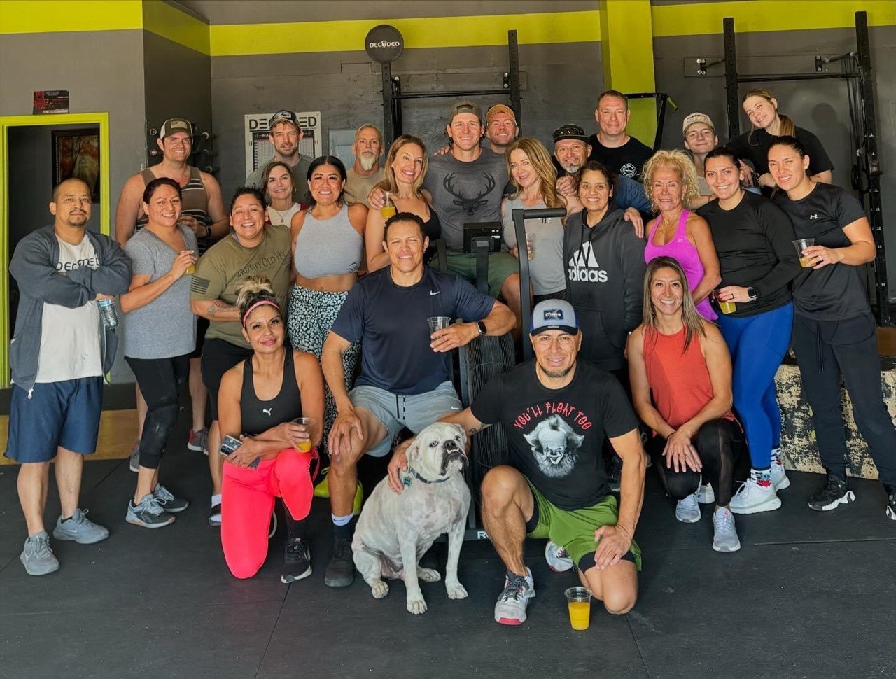 Decoded Fitness big group photo with the gym bulldog up front