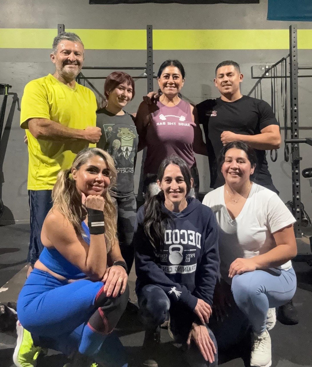 Small group posing together after a workout