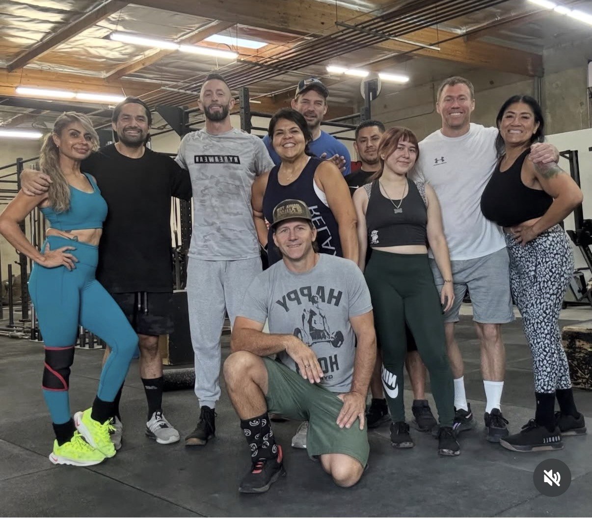 Group of members posing together in front of the rig