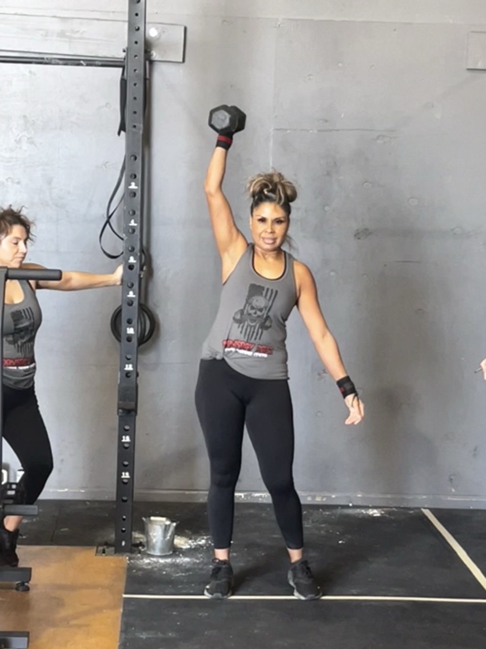 Doomsday 2023 dumbbell snatch overhead
