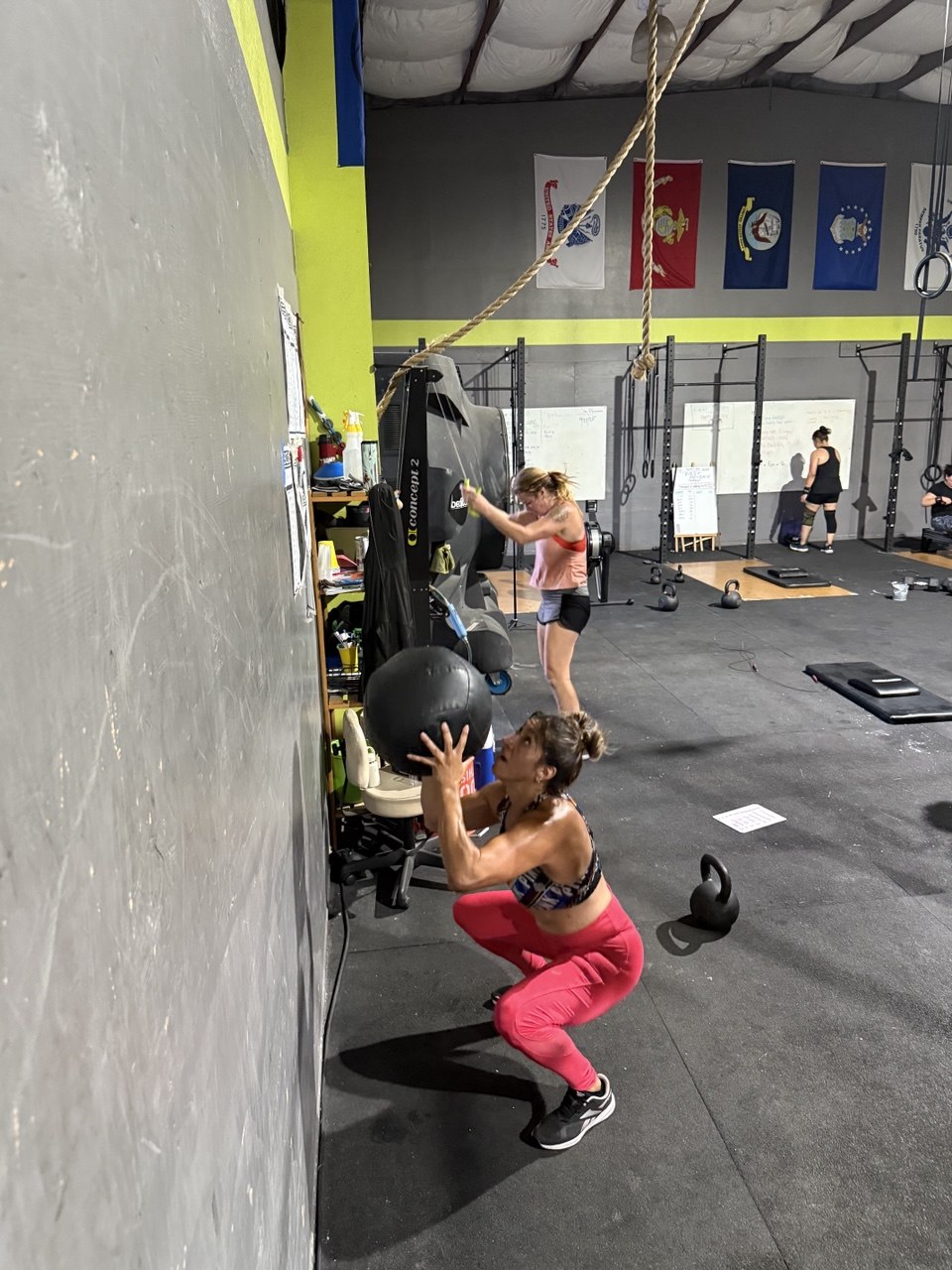 First Friday member throwing a wall ball
