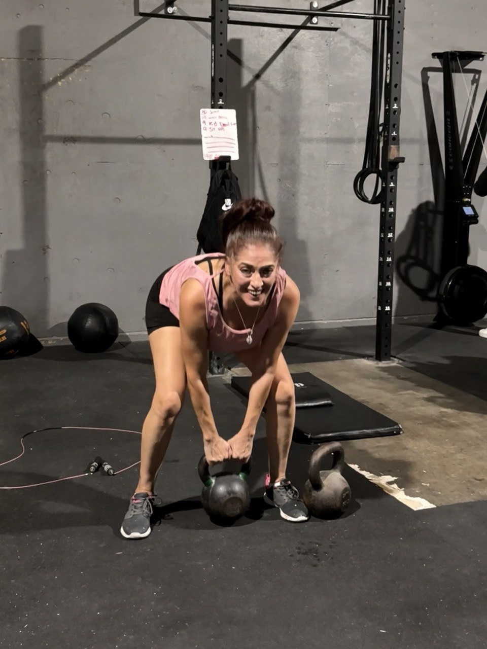 First Friday member with a kettlebell