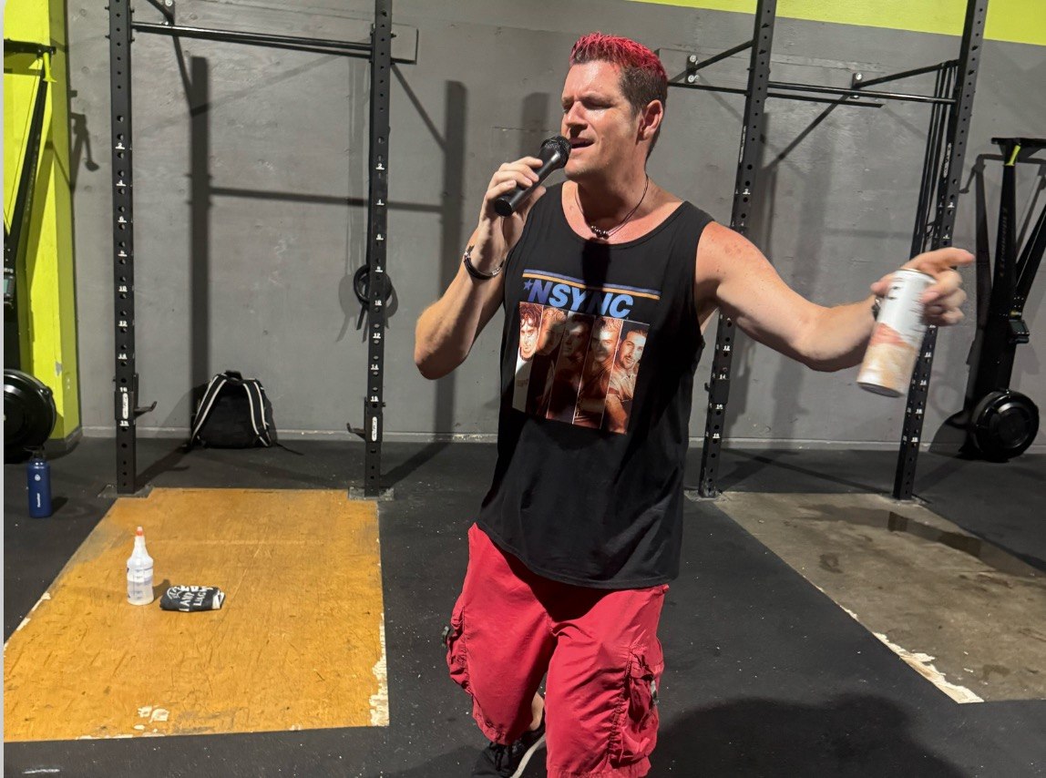 First Friday karaoke moment in an NSYNC tank